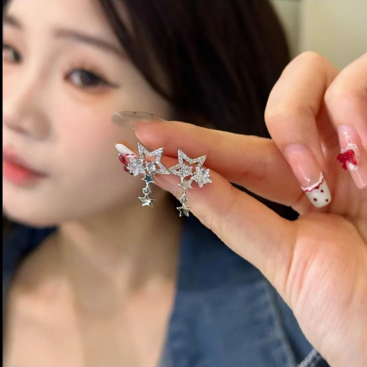 Star River ~ New Zircon Star Tassel Stud Earrings, a unique bestseller, exudes a sense of light luxury and high-end elegance, and is a niche earpiece full figure