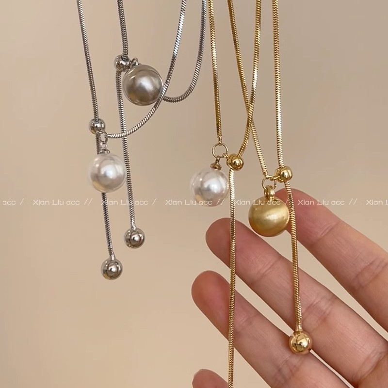 Adjustable high-brightness pearl necklace with a sense of design, light luxury and niche collarbone chain, simple and elegant sweater chain for women Application Scenario