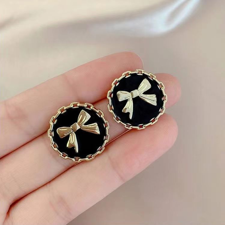 The 2025 new s925 glazed circular bow stud earrings are elegant, retro, versatile and niche ins earrings that exude a feminine charm full figure