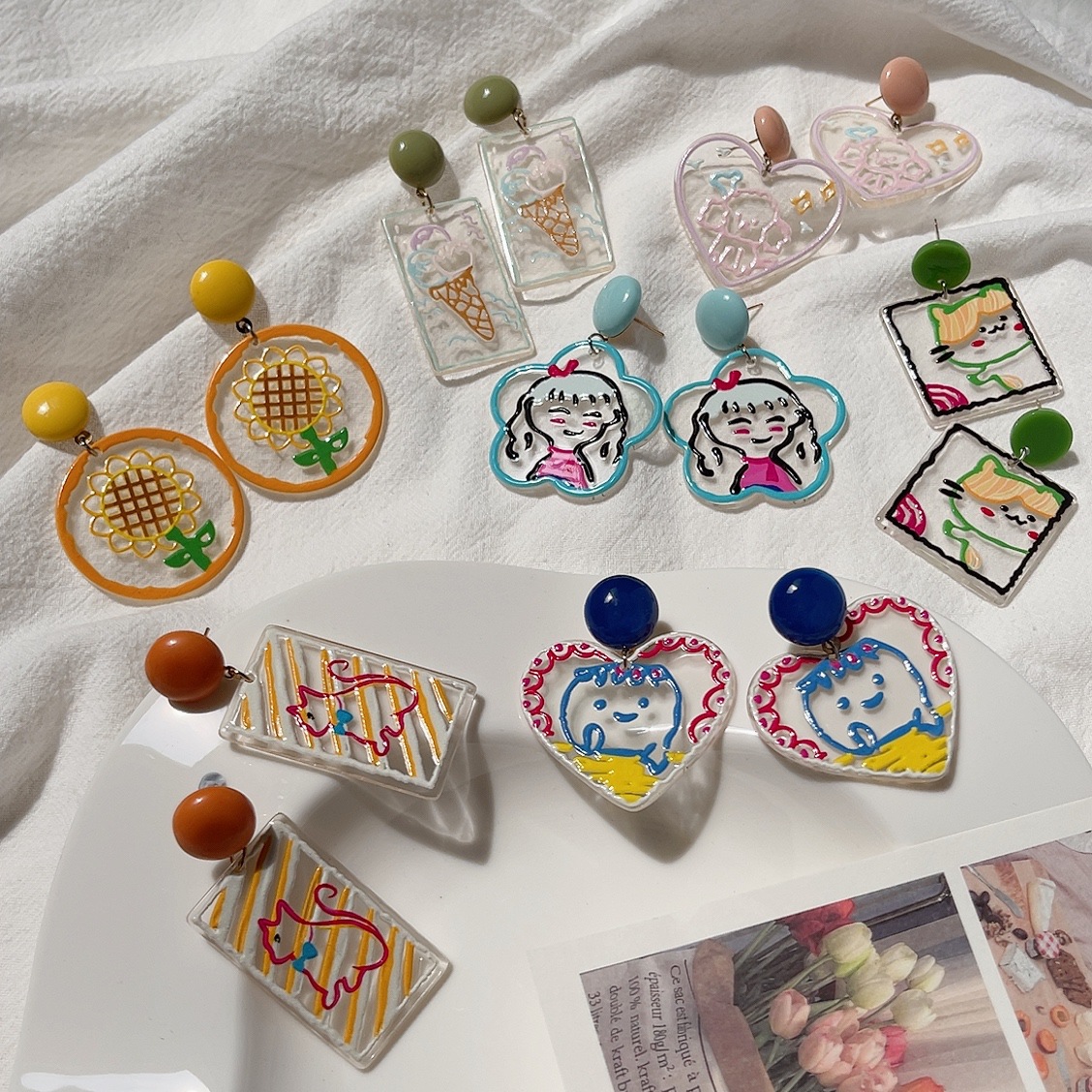 Japanese and Korean Kawaii cute and childlike style girl ear studs on Instagram, a variety of cartoonish and unique small earrings details Picture