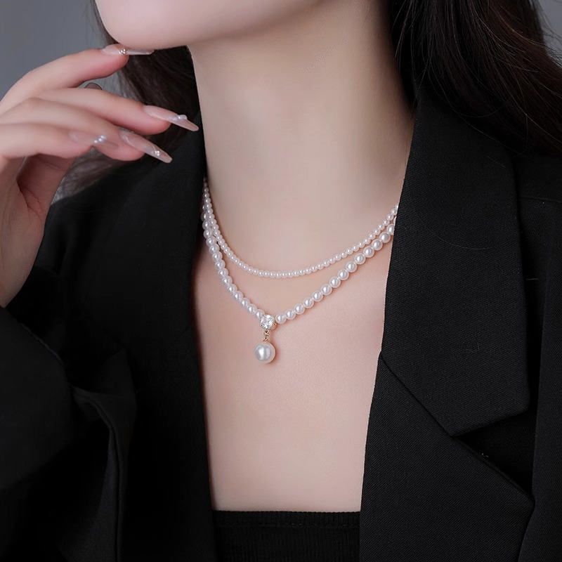The new pearl double-layer necklace in 2024, a stylish collarbone chain, is a versatile and niche accessory for women Application Scenario