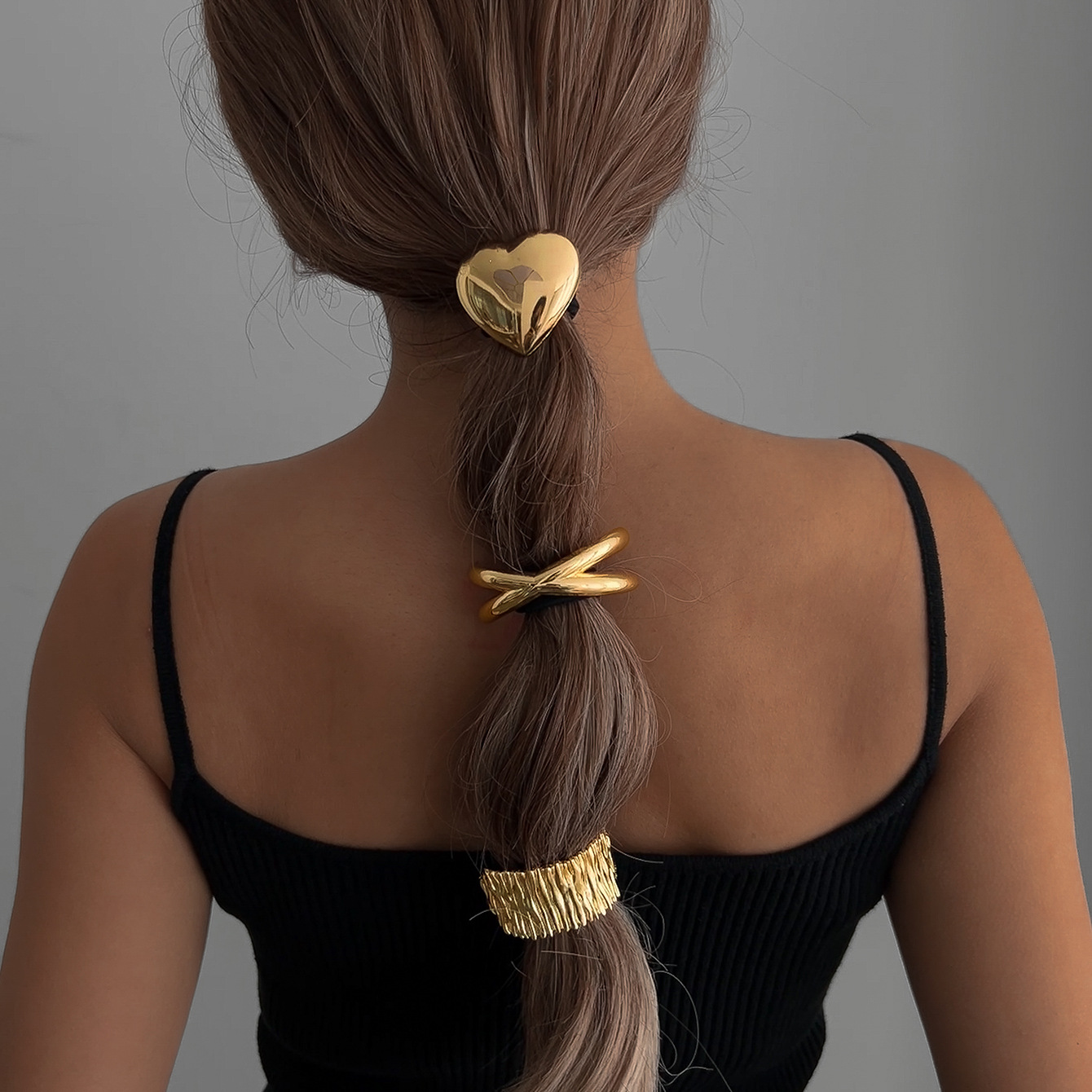 Wholesale of cross-border hair accessories from Europe and America: Alloy heart-shaped pleated hair bands, fashionable high-elasticity ponytail hair accessories for women, and hair strings full figure