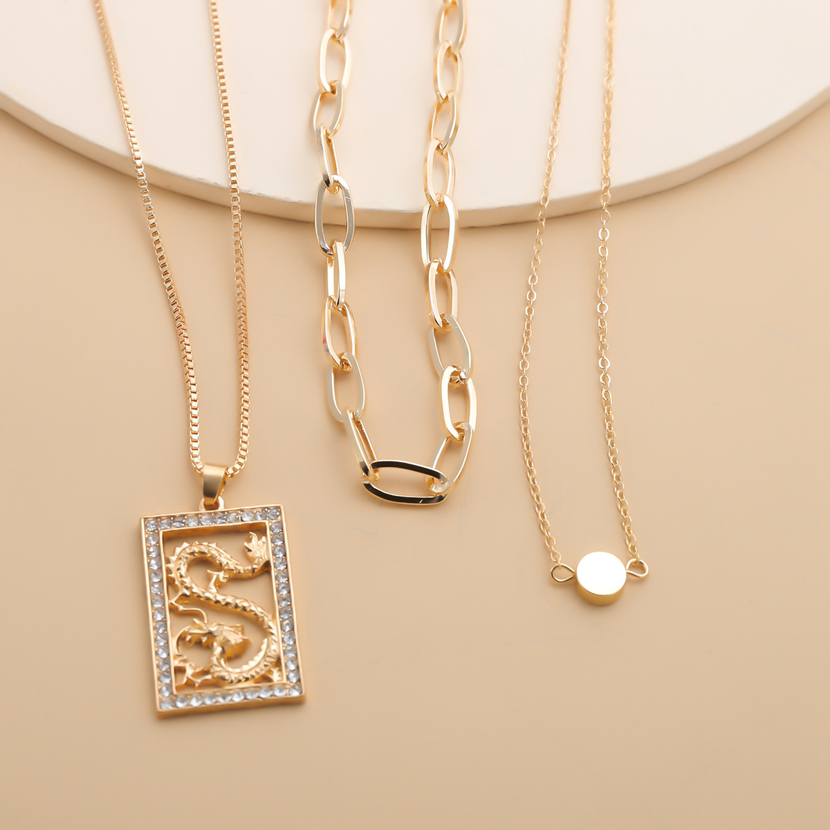 European and American cross-border jewelry, personalized round bead cross-chain pendant necklace, female punk hollowed-out dragon-shaped water diamond necklace Application Scenario