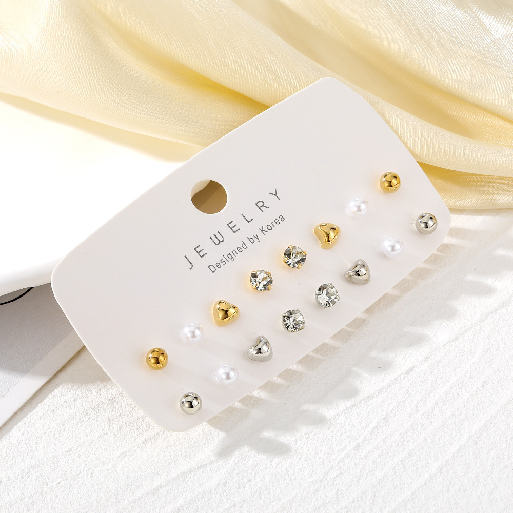Wholesale of exquisite, simple and small heart-shaped earrings from Europe and America, fashionable and versatile for women, and niche diamond stud earrings and other accessories Specification drawing