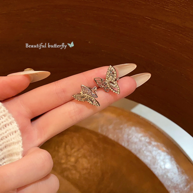 Super ethereal and elegant hollowed-out diamond-encrusted butterfly ear bone clip earrings, versatile for women, high-end and elegant stud earrings wholesale details Picture