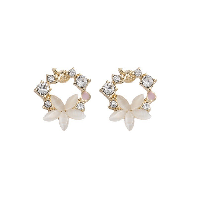 The 2025 new French light luxury style cat-eye zircon flower stud earrings 925 silver needle niche design earrings Item Picture