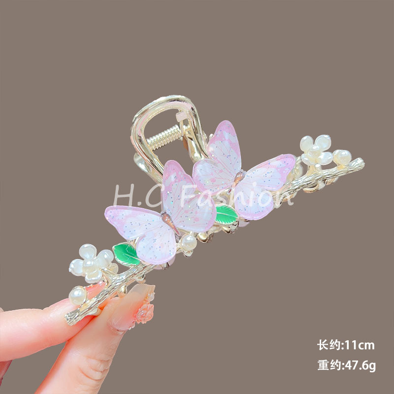 New niche design metal gripper, large deep-sea blue fishtail gripper, pearl style shark clip at the back of the head Application Scenario