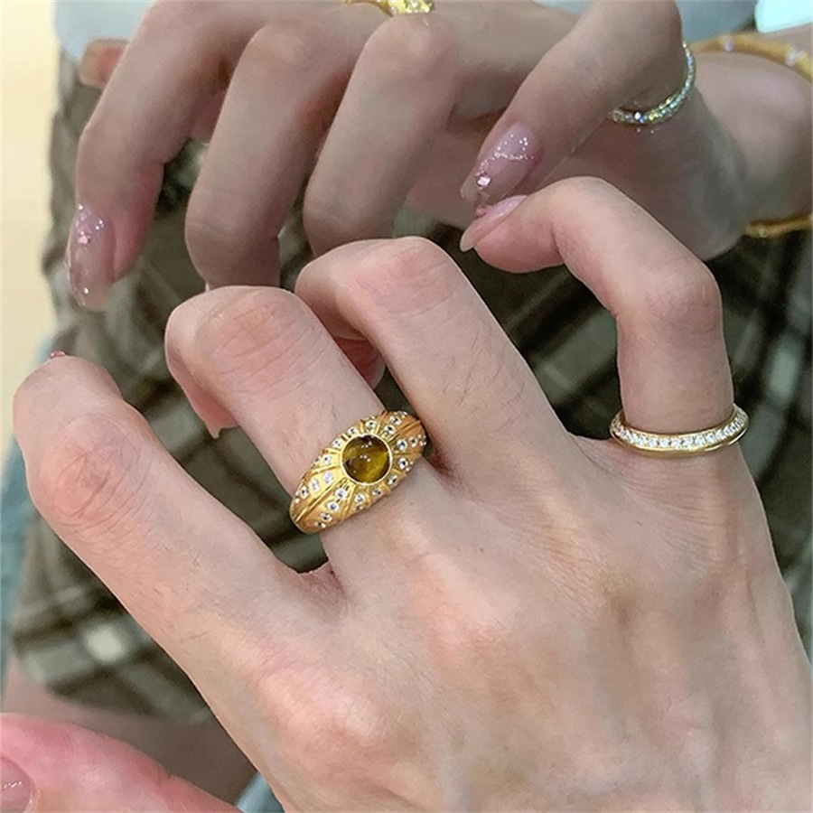A vintage golden tiger's eye brushed ring for women, a slightly inlaid zircon index finger ring with a touch of light luxury and high-end charm Application Scenario