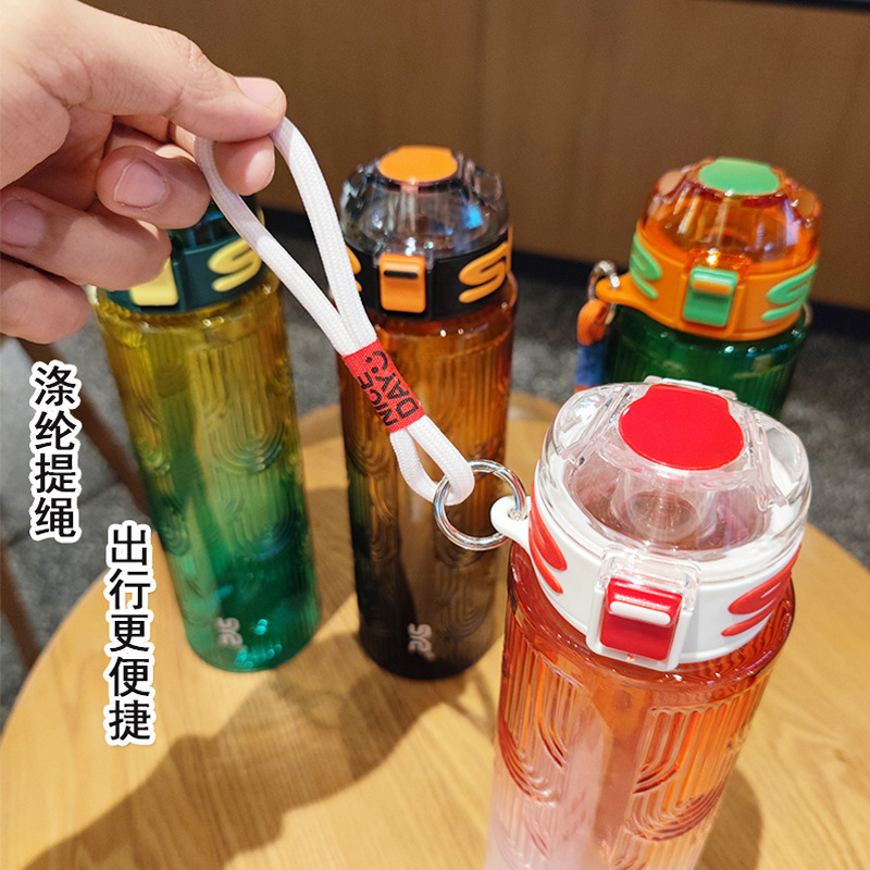 New colorful plastic water cup with a portable handle, high appearance level, outdoor sports water cup with a pop-up lid and large capacity Specification drawing