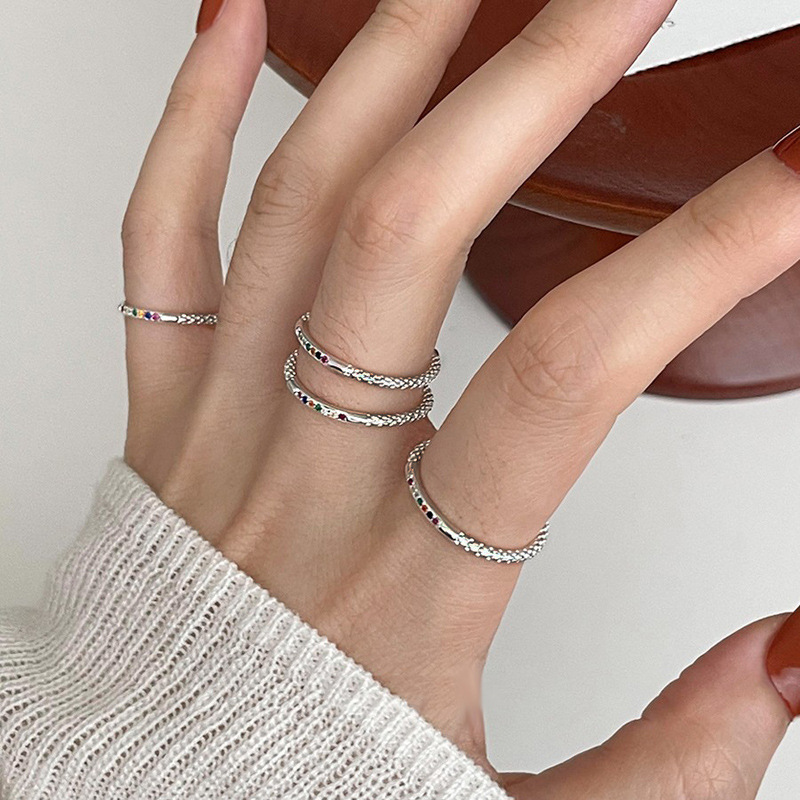 The small colored diamond zircon rainbow open ring is a unique design for women, with a high-end and individual style. It can be stacked to make the hand look slender and simple details Picture