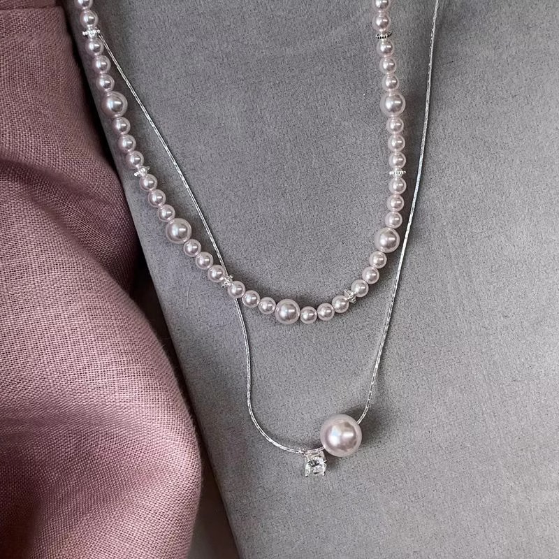 French niche and light luxury Manta rose pearl zircon necklace for women on Instagram, a versatile French layering collarbone chain full figure