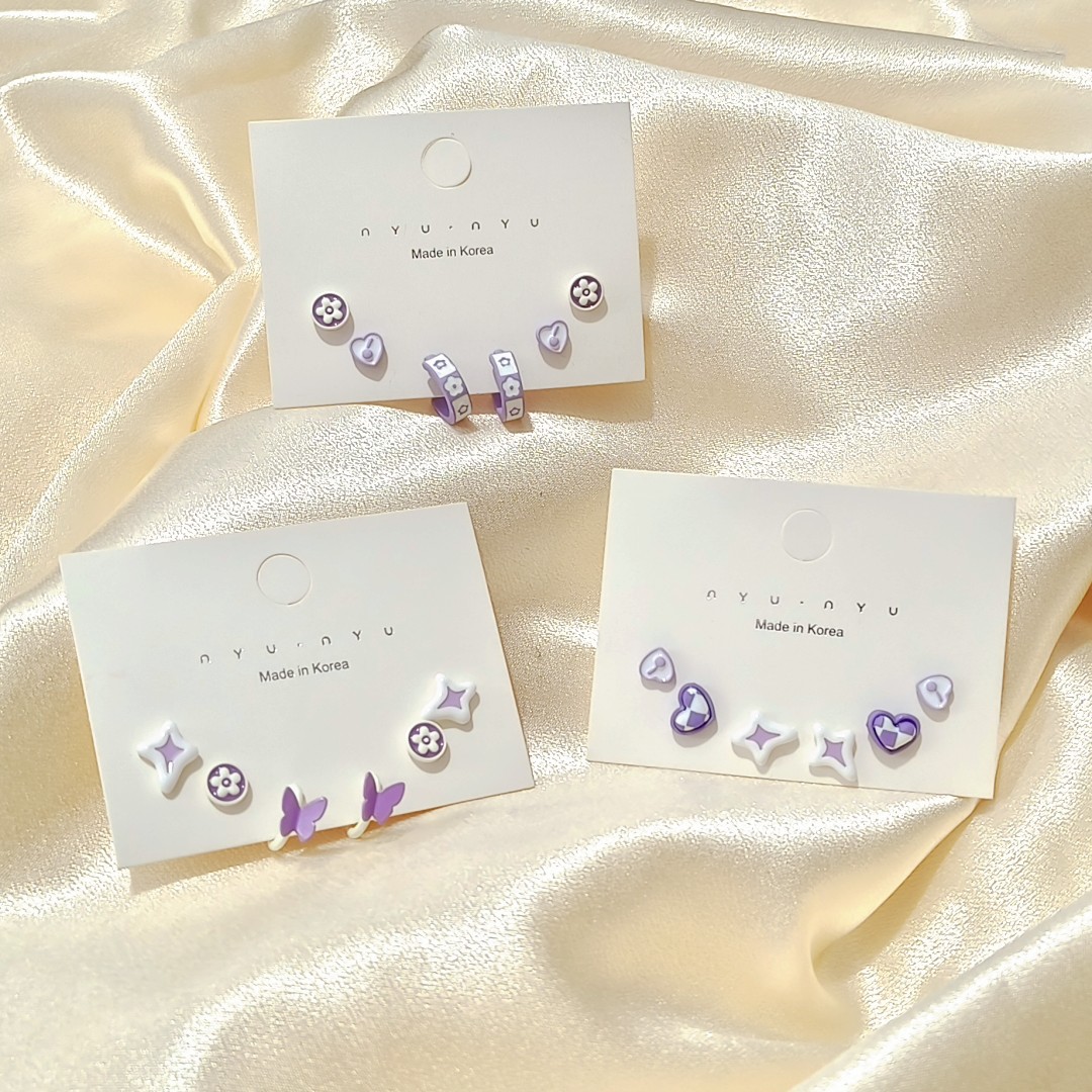 The enchanting purple three-piece set of stud earrings is a versatile and gentle, sweet, and niche design set of earrings and earrings full figure