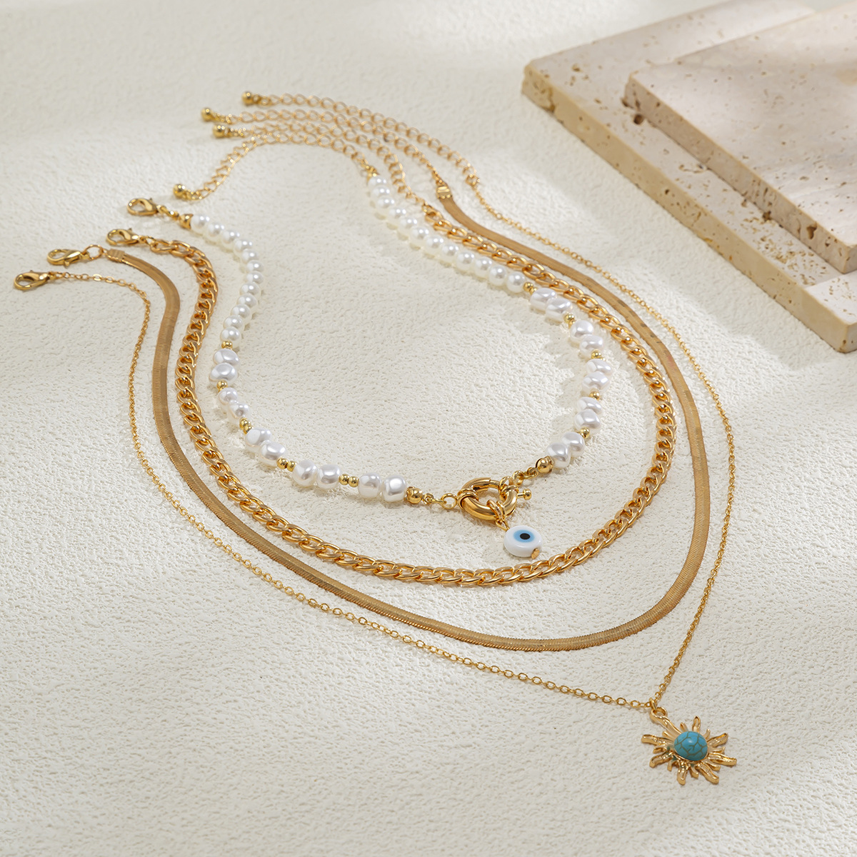 European and American cross-border jewelry, ethnic-style irregular-shaped pearl beaded necklace, retro alloy suneye collarbone chain Application Scenario