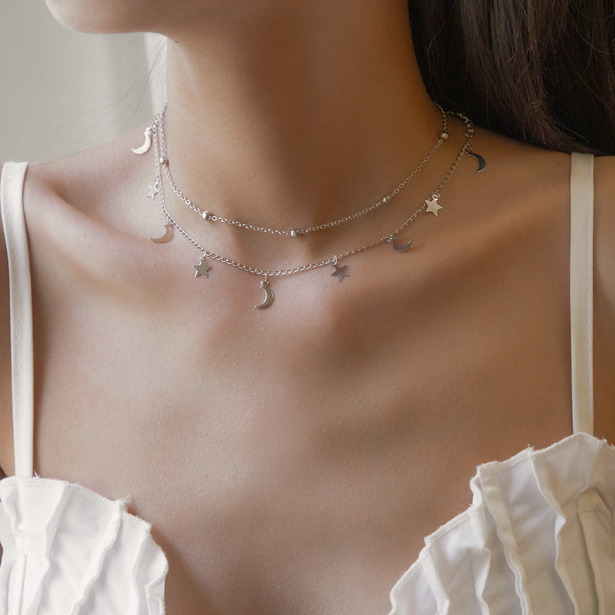 Fashionable star and moon tassel fine chain necklace, simple and retro metal copper piece necklace, European and American cross-border jewelry full figure