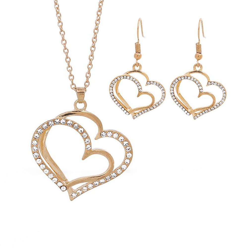 European and American women's heart-shaped jewelry set, retro, fashionable and individual alloy diamond-encrusted hollow heart-shaped pendant necklace earrings Item Picture