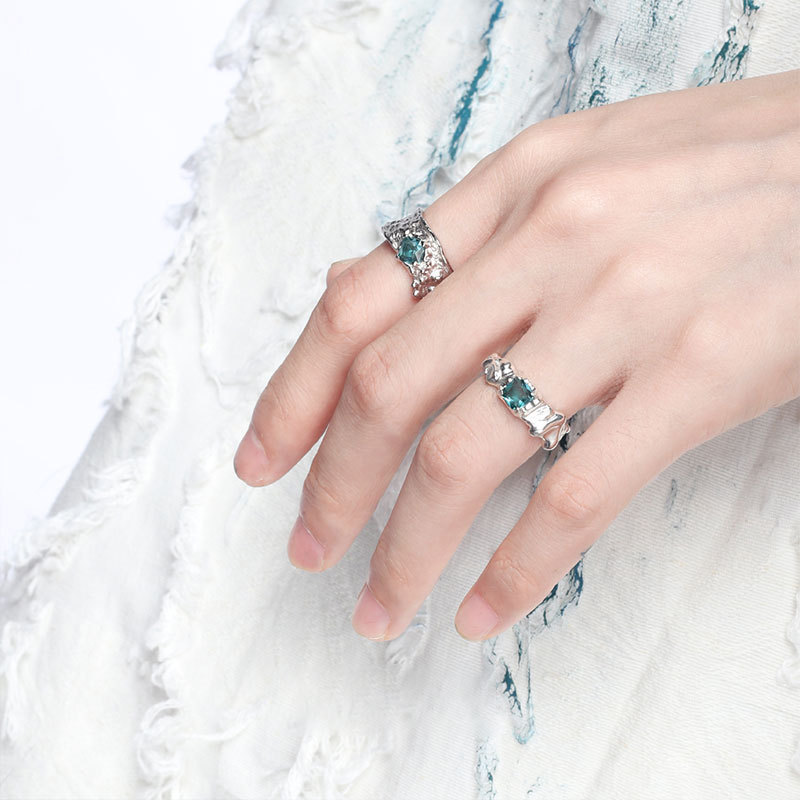 The new 2023 niche design ring with a concave-convex and cold style, made of sea blue zircon with a high-end feel and adjustable opening details Picture