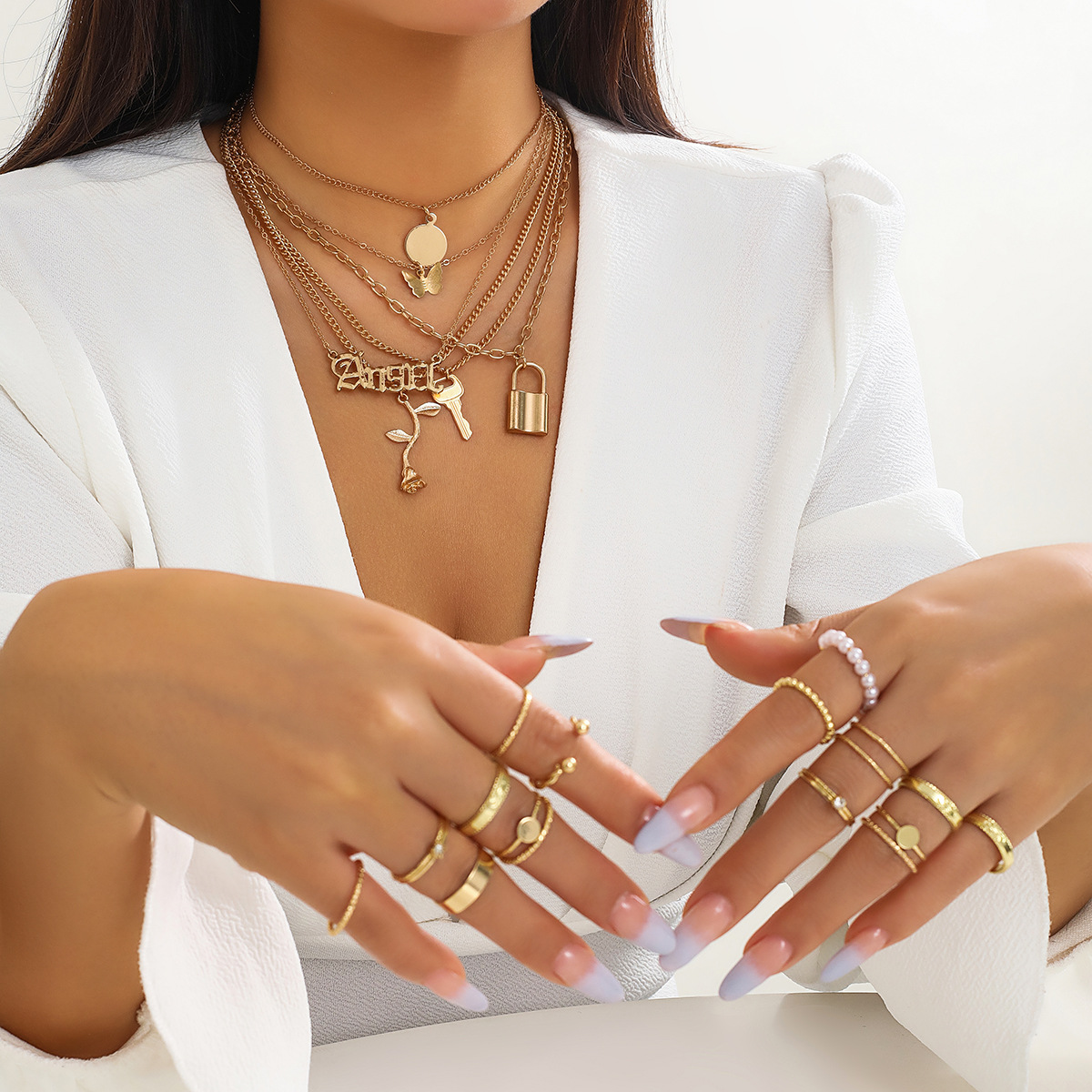 European and American cross-border jewelry layering, cold style butterfly necklace set, niche metal chain angel letter necklace details Picture