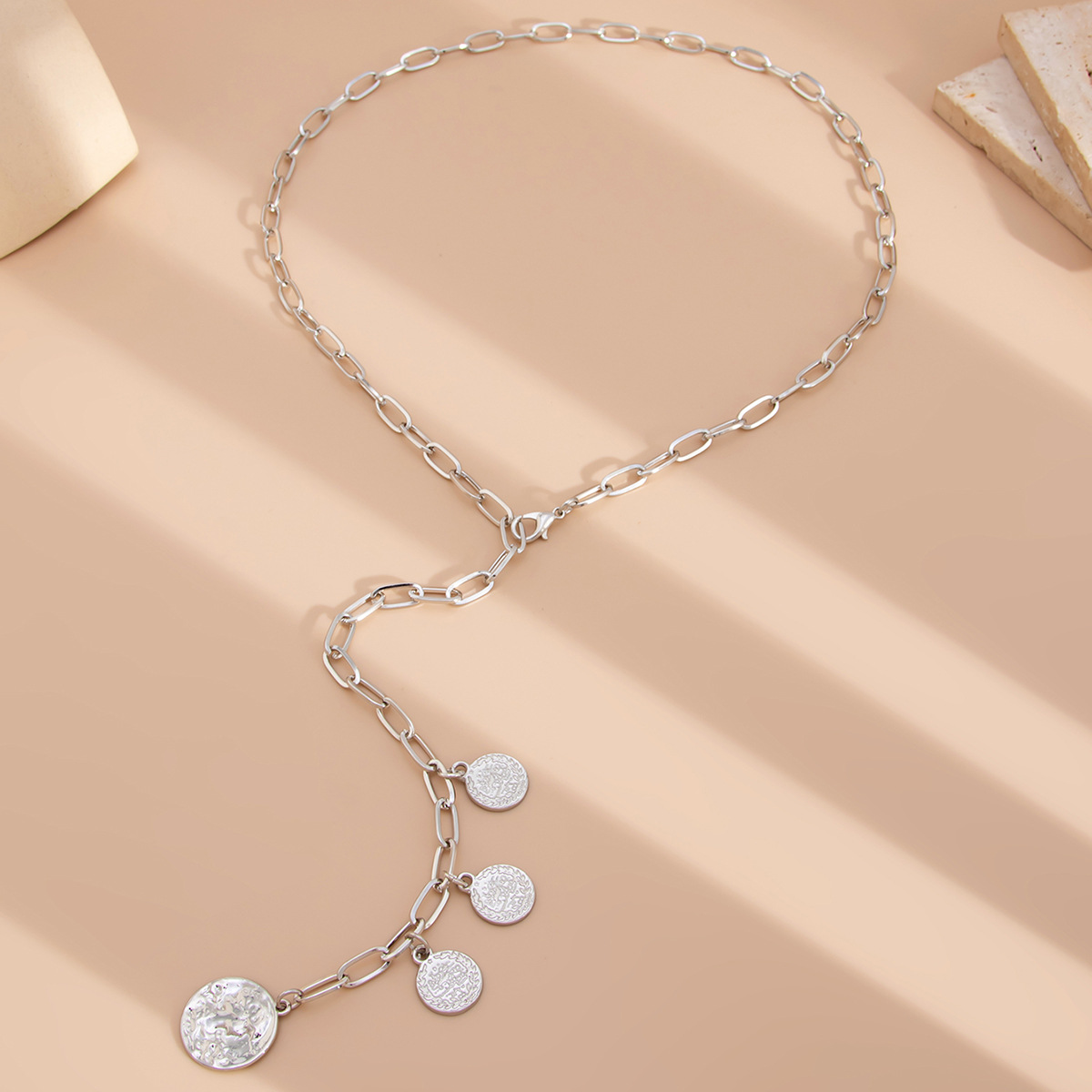 European and American cross-border jewelry, InS-style round plate alloy pendant, collarbone chain, heavy design, tassel cross chain necklace Application Scenario