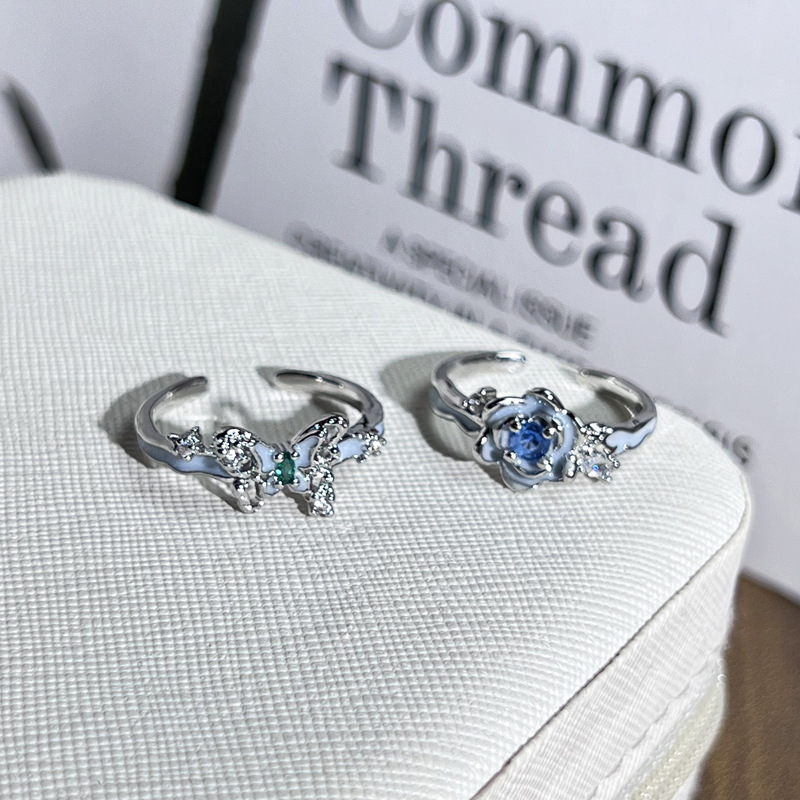 Elegant jasmine blue diamond butterfly couple ring, with unique enamel flowers, exquisite and niche design sense, high-end ring Specification drawing