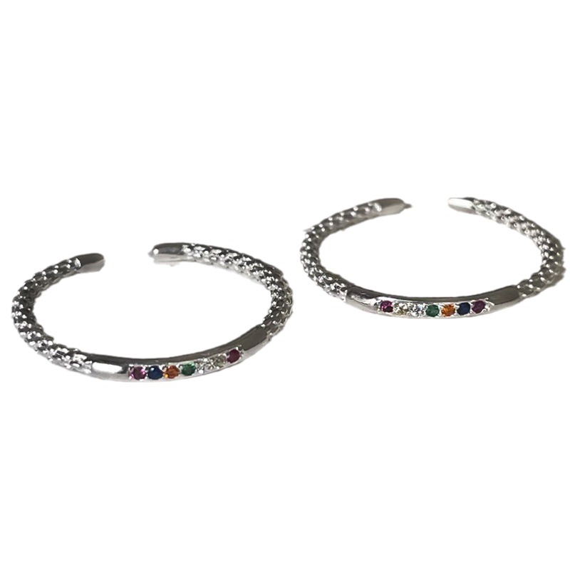 The small colored diamond zircon rainbow open ring is a unique design for women, with a high-end and individual style. It can be stacked to make the hand look slender and simple Item Picture
