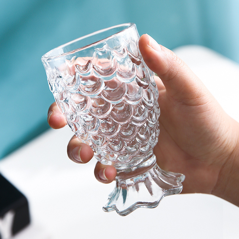 Wholesale of Douyin mermaid glass cups, milk tea ice cream cups, creative juice cold drink cups, fish tail and fish scale cups, and small wine glasses full figure