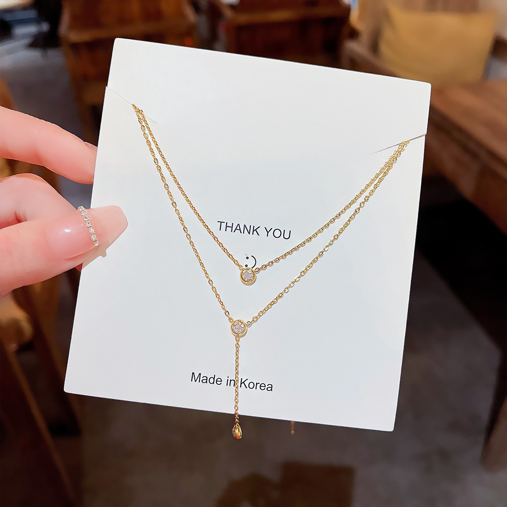 Titanium steel double-layer tassel necklace with a niche design sense, popular collarbone chain with a light luxury and high-end feel, non-fading jewelry wholesale full figure
