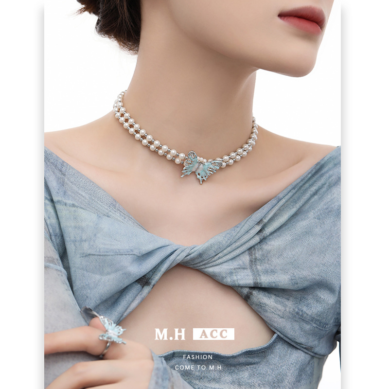 The lake blue butterfly pearl necklace with a retro design sense, double-layer layering collarbone chain, and an ins high-end, niche accessory full figure