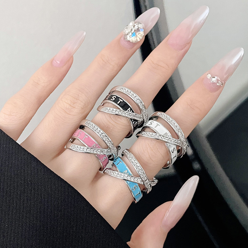Saturn letter three-layer hollowed-out diamond-encrusted oil drip ring, a female Internet celebrity's light luxury, trendy and high-end surrounding enamel open ring full figure