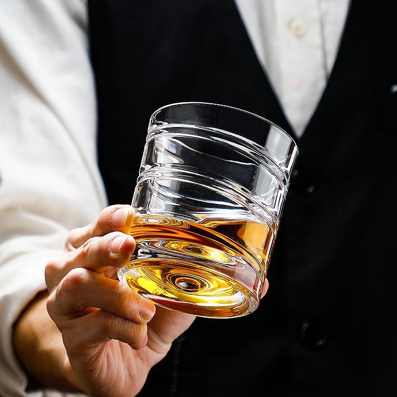 Wholesale of unbreakable whisky cups, embossed glass cups, rotating cups, spirits cups, and creative rotating foreign wine cups Specification drawing