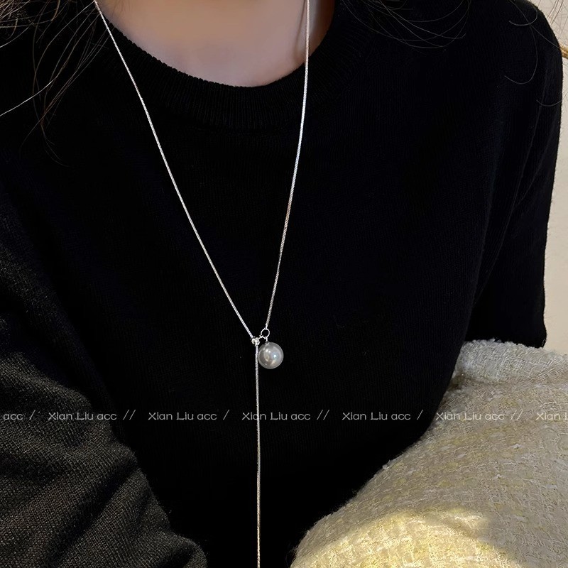 Adjustable high-brightness pearl necklace with a sense of design, light luxury and niche collarbone chain, simple and elegant sweater chain for women details Picture