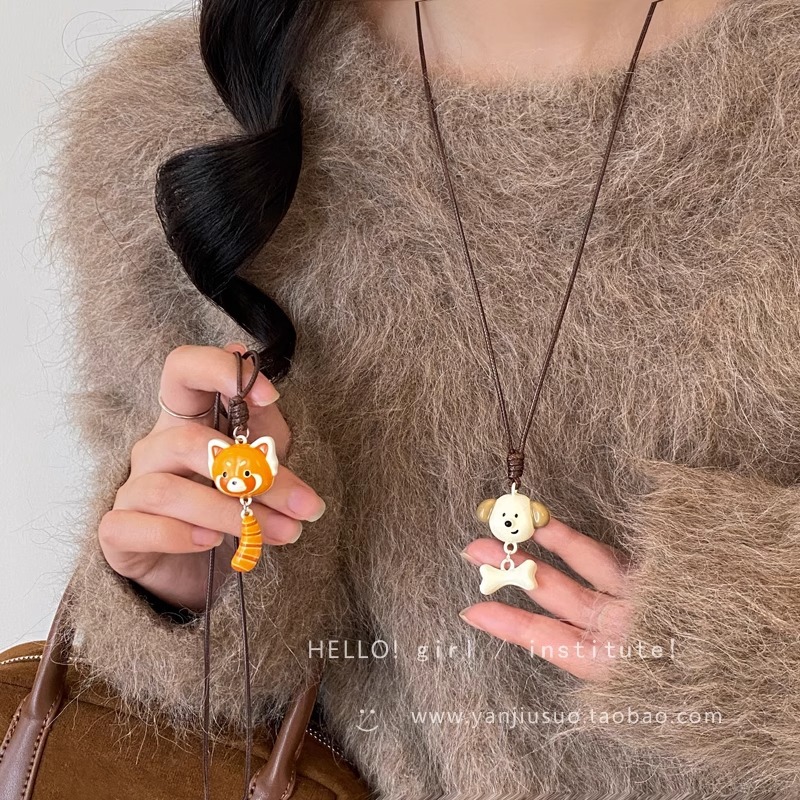 Cute and adorable raccoon and dog pendant necklace, long design for women, pull-out neck sweater chain, a rare and versatile necklace Application Scenario