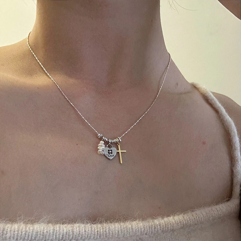 Silver silver metallic pearl heart-shaped cross tassel necklace, simple and versatile for women, elegant and stylish collarbone chain Application Scenario