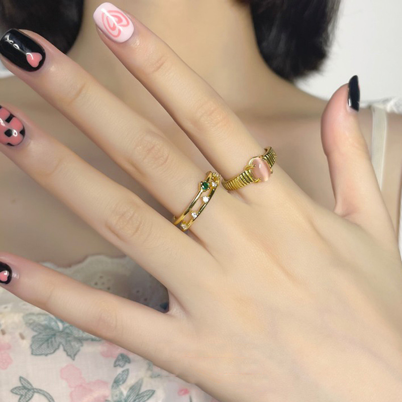 A light luxury, high-end, exquisite and elegant pink cat's eye, golden opening ring, a niche design for women, an InS-style food ring details Picture