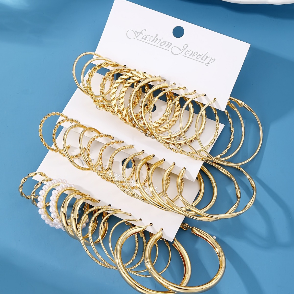 Youdaoplaceholder0 set European and American metal earrings, cross-border new ins earrings, gold C-shaped earrings with water diamonds for women details Picture