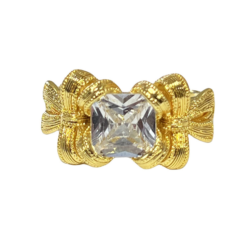 A Chinese-style pigeon egg, sea blue zircon open ring, a female heart bow, a fashionable brushed sweet and cool luxurious ring Item Picture
