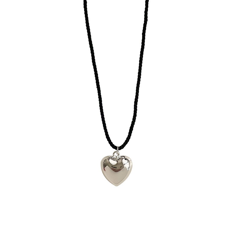 A long braided rope metal heart-shaped pendant necklace for women, a unique, retro, simple and versatile Korean necklace with a stylish look Item Picture