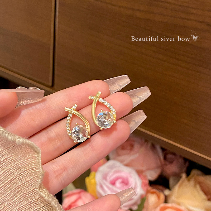 S925 Silver Needle Exquisite Zircon cross Earrings are versatile for women, exuding a sense of high-end luxury and a touch of light luxury. Wholesale of best-selling earrings full figure