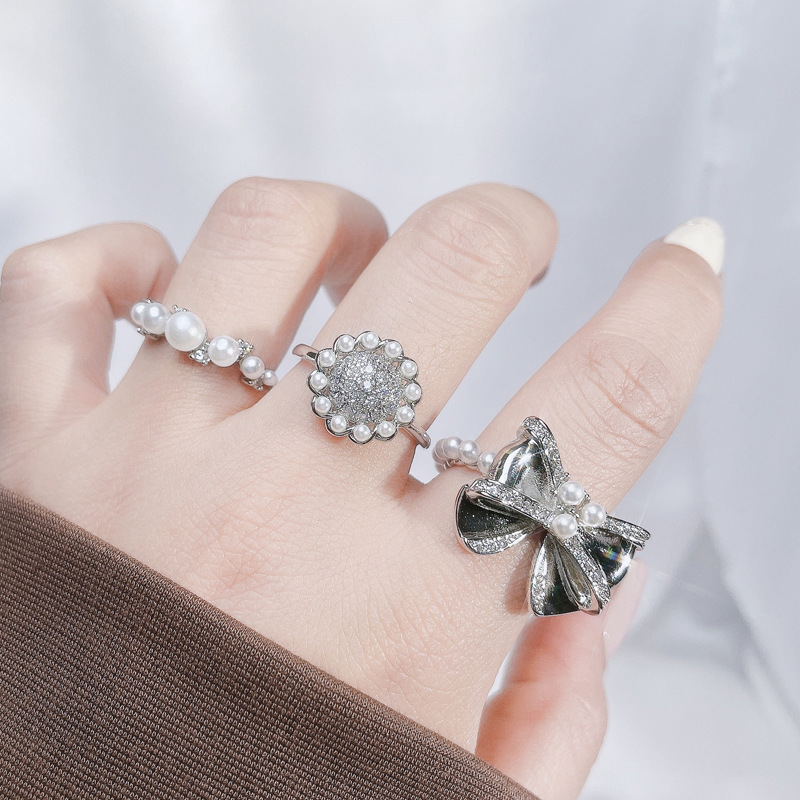French light luxury high-end pearl bow open ring, sweet and cool, versatile, autumn and winter fashion accessory ring full figure