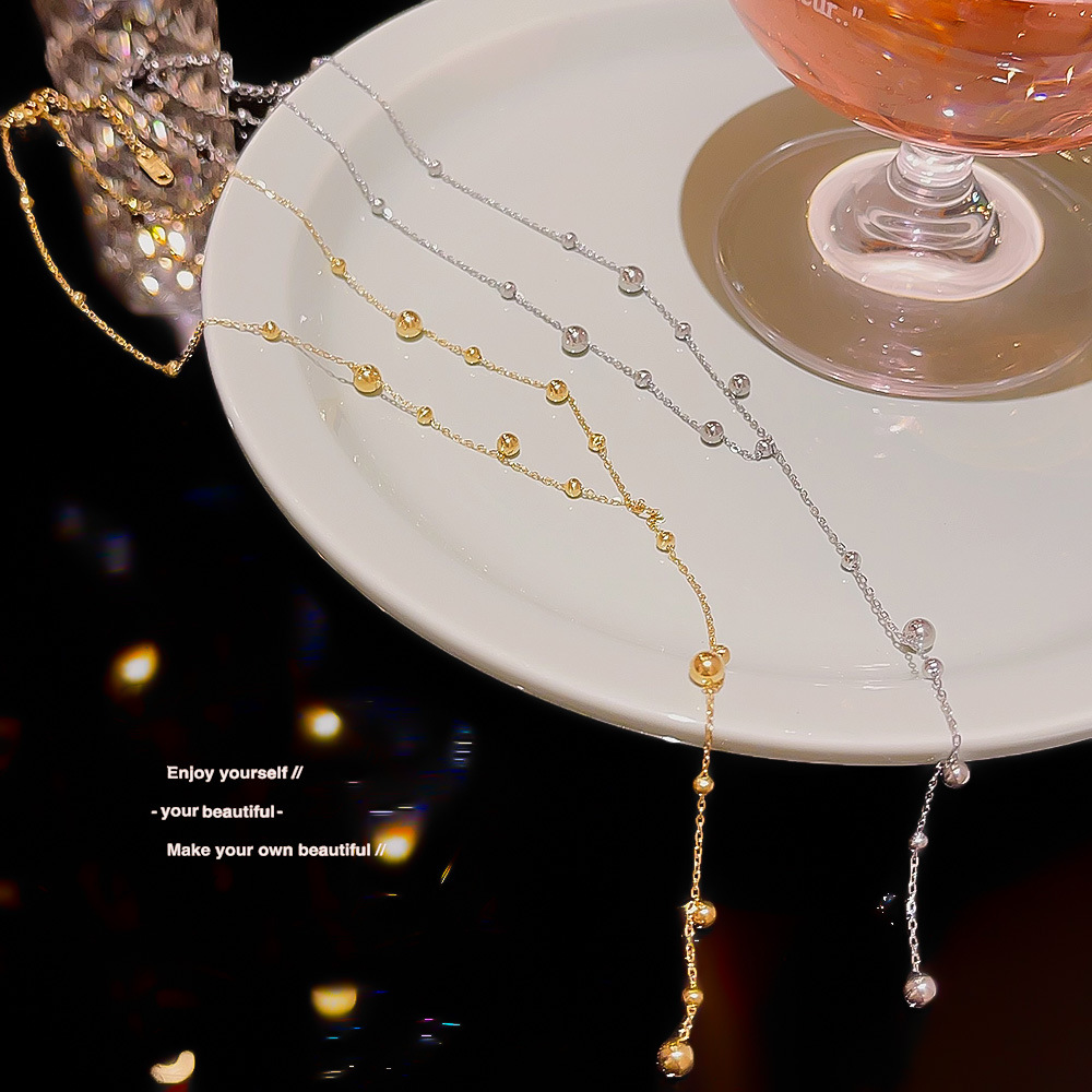 A high-end and elegant starry sky pearl tassel necklace for women on Instagram, a cold style collarbone chain, a versatile long sweater chain full figure