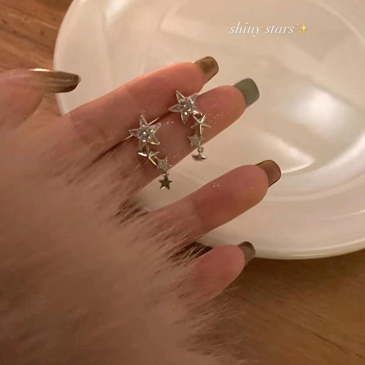 Zircon star earrings, a niche design for women with a high-end feel, are new trendy autumn and winter short tassel earrings from 2025 full figure