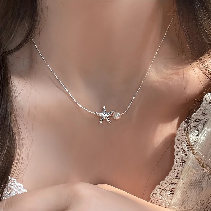 Summer beach silver starfish necklace for women, light luxury, niche and simple style, pearl collarbone, internet-famous necklace wholesale full figure