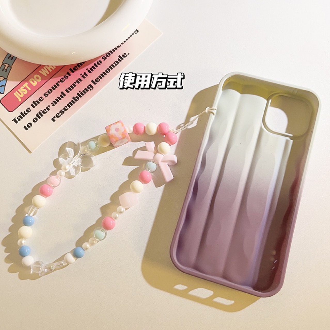 Bow pink Magic cube flower mobile phone chain for women, ins style, fashionable and fresh wrist pendant, handcrafted beaded chain full figure
