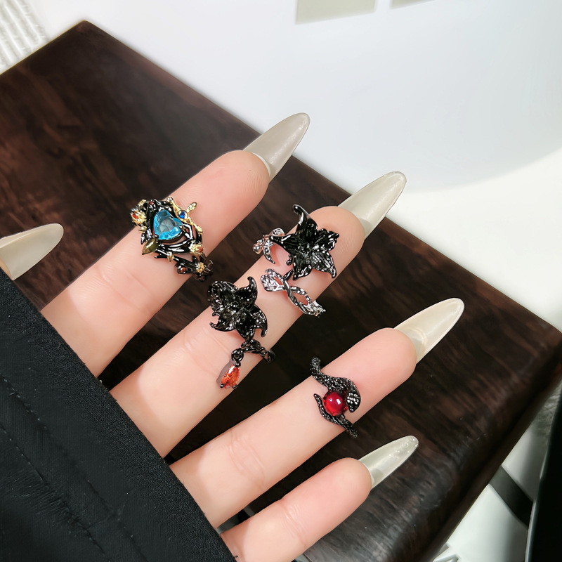 Cool and trendy dark wing crown, heart-shaped sea blue zircon ring, retro thorn rose two-color flower punk ring details Picture