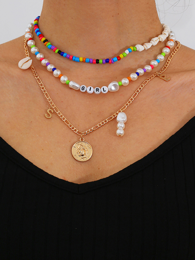 A simple and individual-style color-blocking rice bead shell woven necklace and a retro European and American imitation pearl patchwork letter necklace Specification drawing