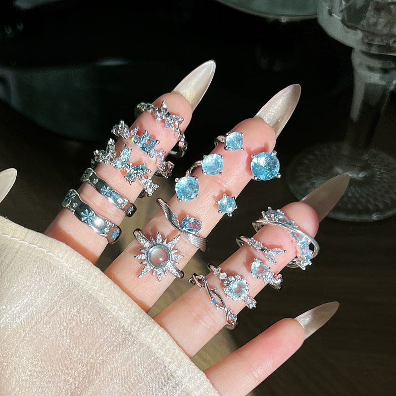Cross-border sea blue zircon butterfly light luxury whitening and elegant niche ring for women, cold style, fashionable and high-end index ring full figure