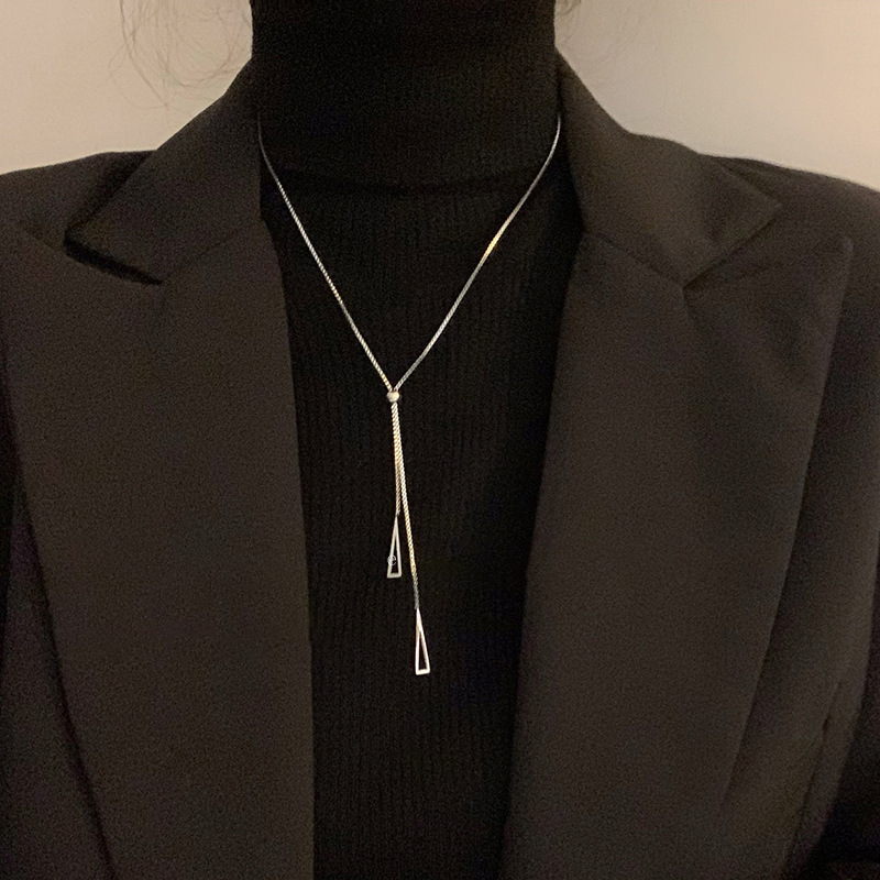 Geometric triangle necklace for women's trendy autumn and winter, long tassel accessory, light luxury and niche decorative sweater chain, ins full figure