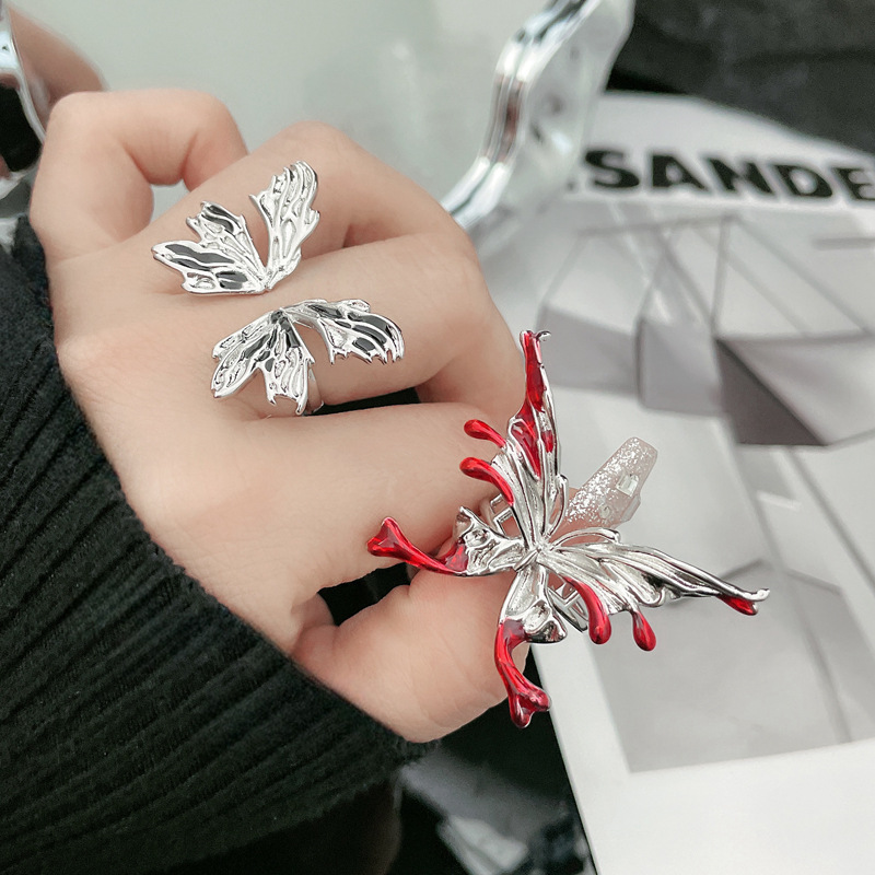 The new liquid irregular butterfly ring is a unique, sweet, cool, exaggerated and spicy girl's dancing personality adjustable index finger ring details Picture