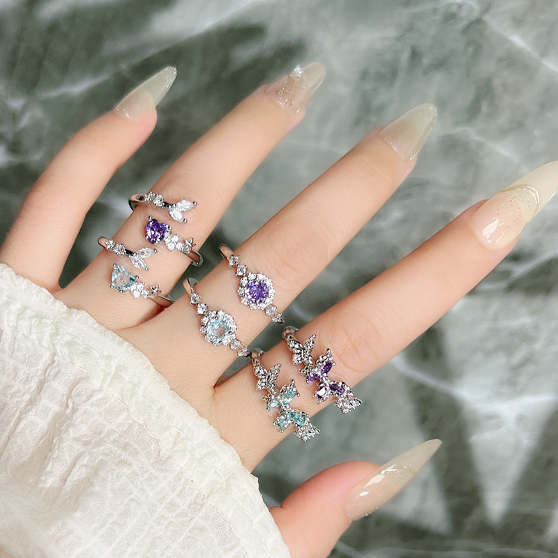 The layered and unique design of the sweet and cool purple diamond and sea blue zircon butterfly ring is a light luxury and cold summer accessory for women full figure