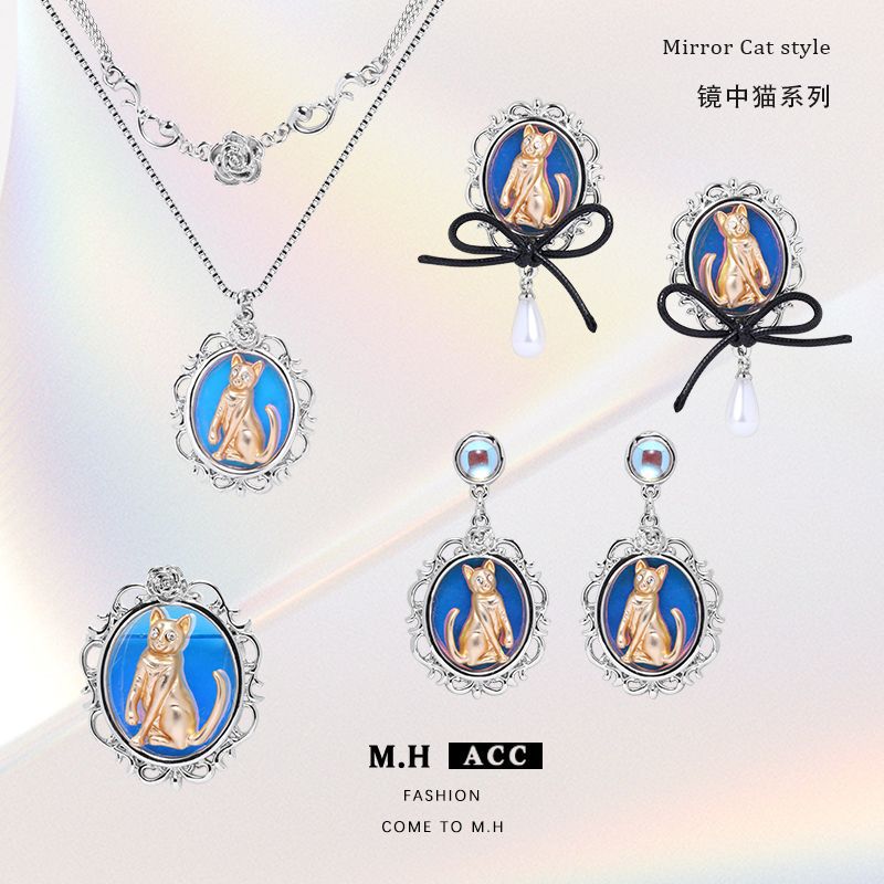 Laser gradient mirror cat earrings design sense, niche Chinese-style earrings, ins original style bow earrings for women full figure