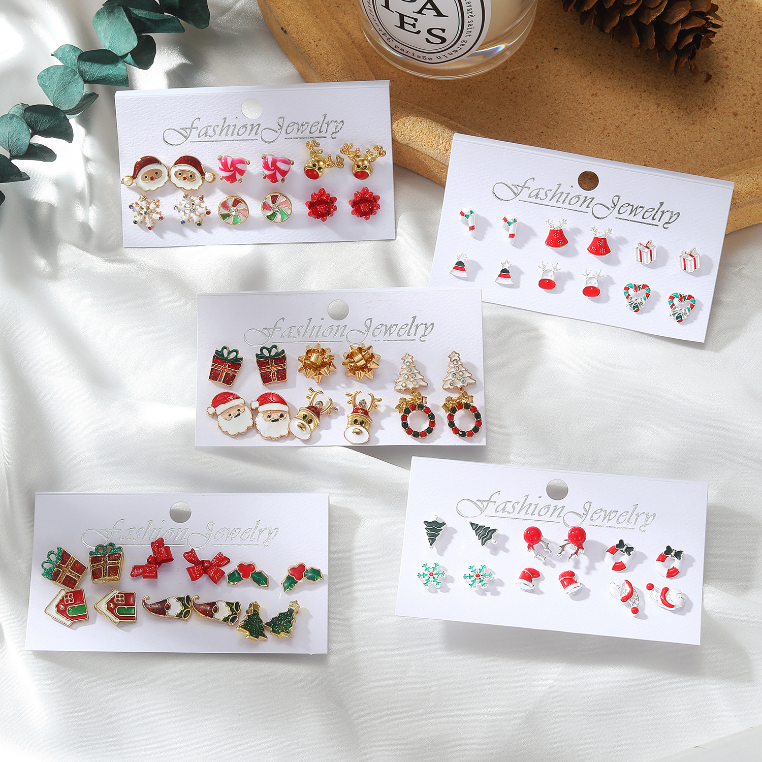 Alloy series snowflake bell stud set, a popular export product. Cartoon oil-dripping walking stick, elderly earrings, women Specification drawing